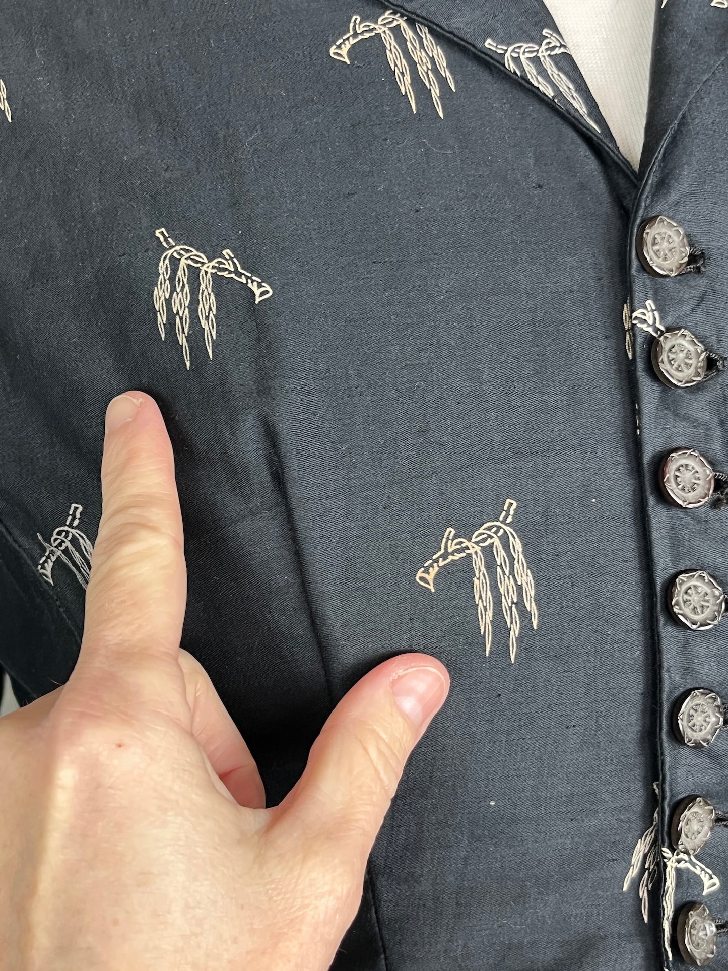 close-up of two branches on bodice that have faint yellow tint