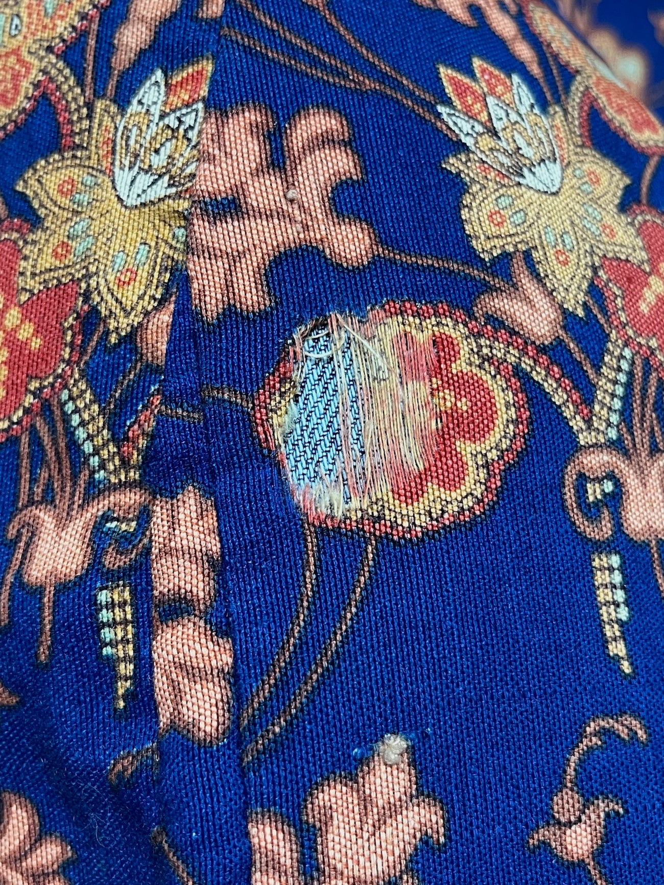 close-up of threadbare wear area on skirt