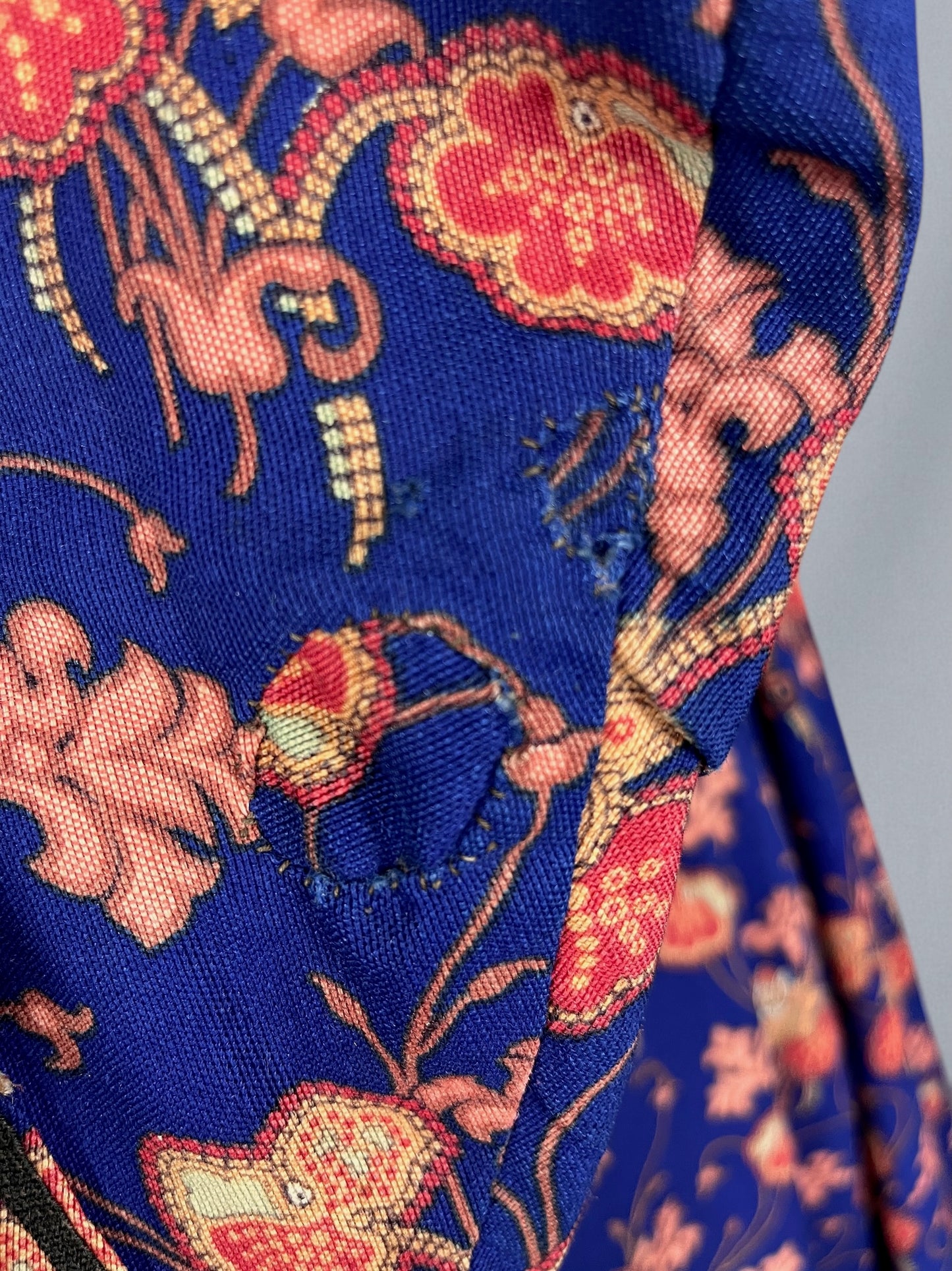 close-up of two patches to sleeve